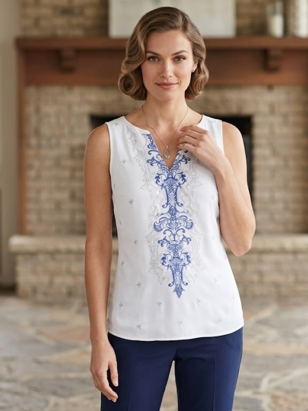 White House Black Market White Sleeveless V-Neck Top with Blue Embroidery